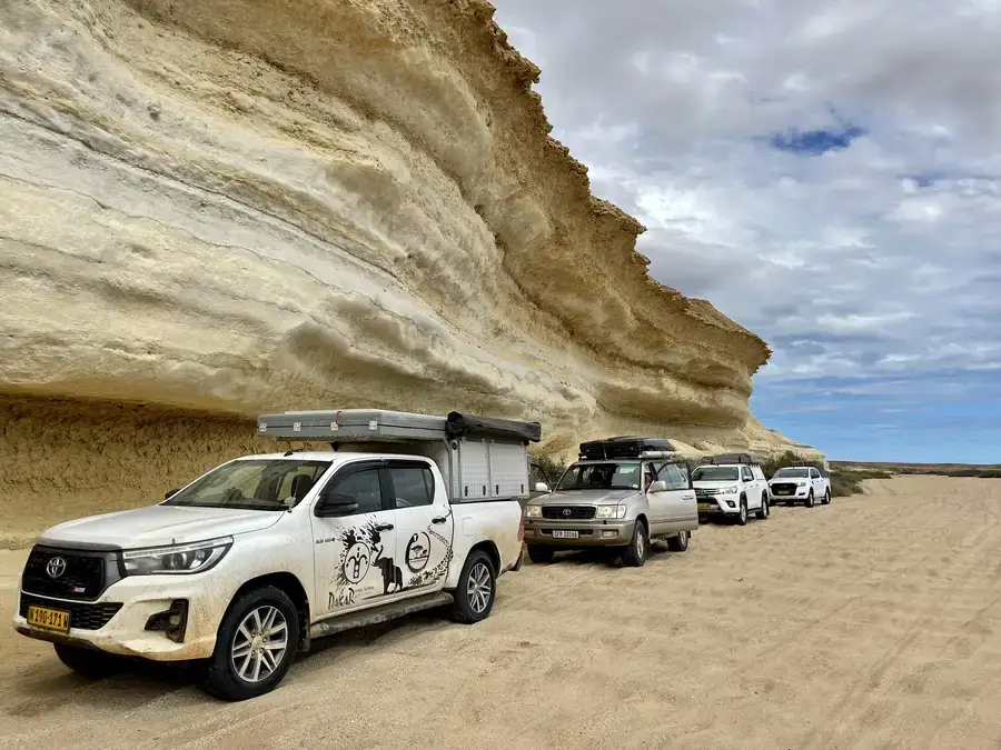 Four-wheel-drive convoy exploring the Angolan coast